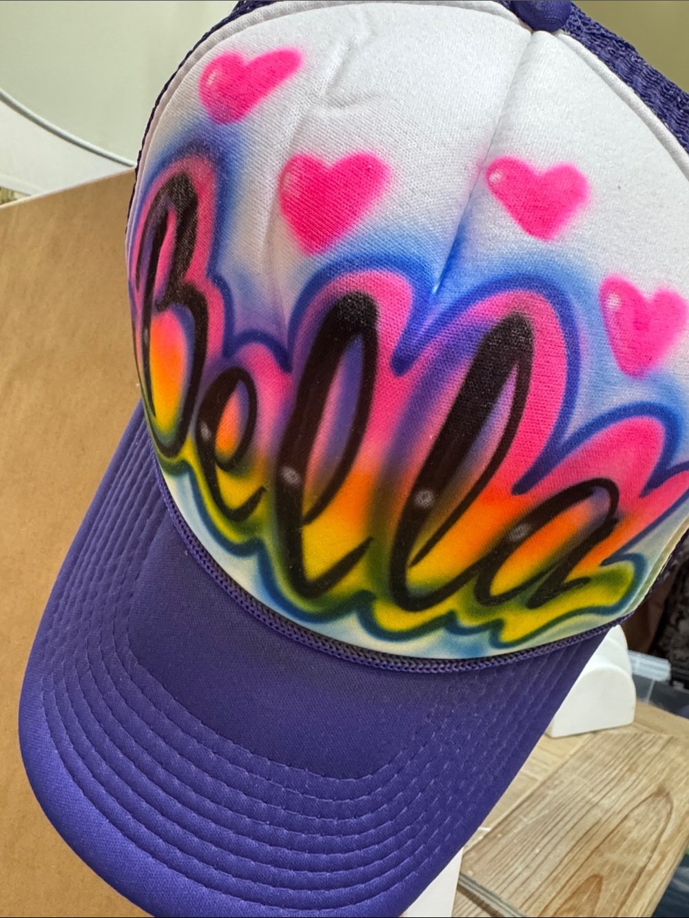 Bella Purple Trucker Hat with Rainbow Graffiti